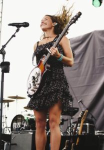 Caroline Jones holding Beard Guitar