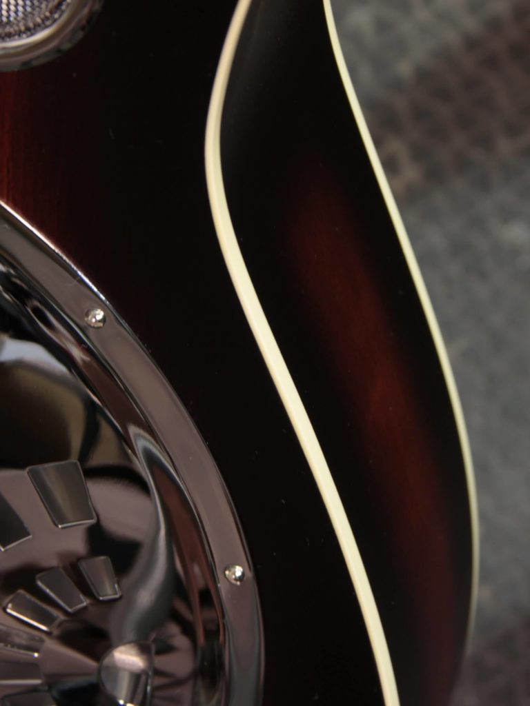 Deco Phonic-57 resonator guitar close up on binding