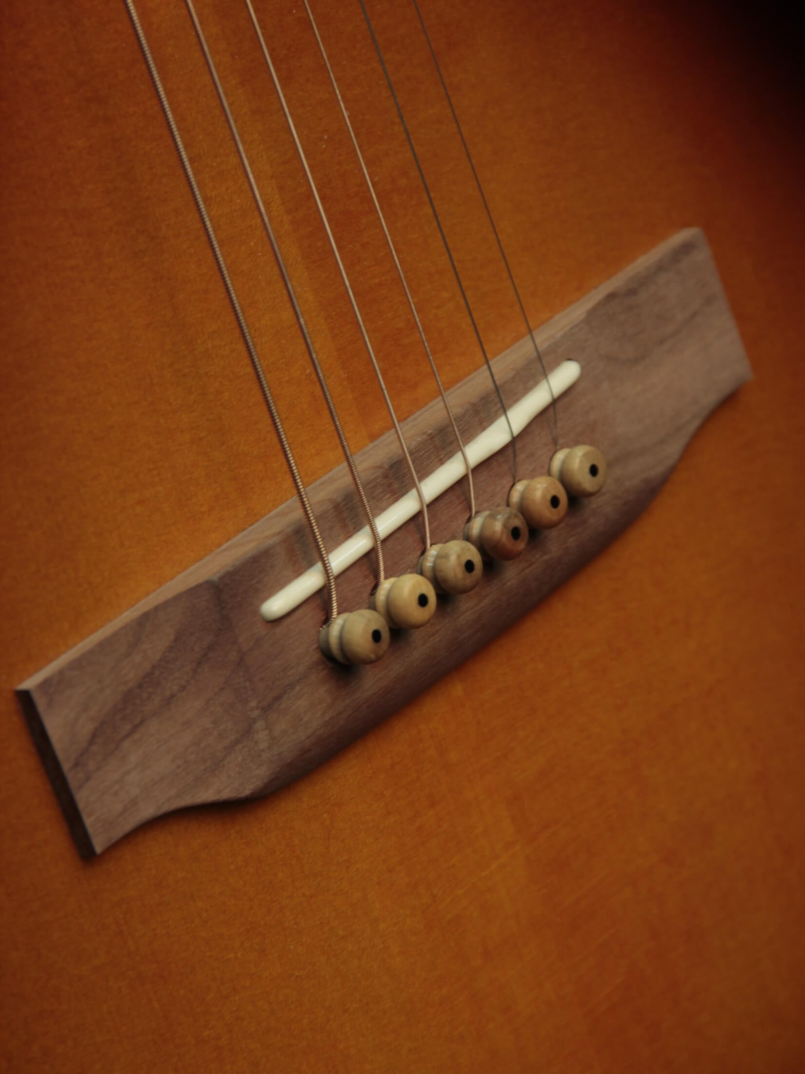 Deco Phonic Sidecar acoustic guitar close up on bridge