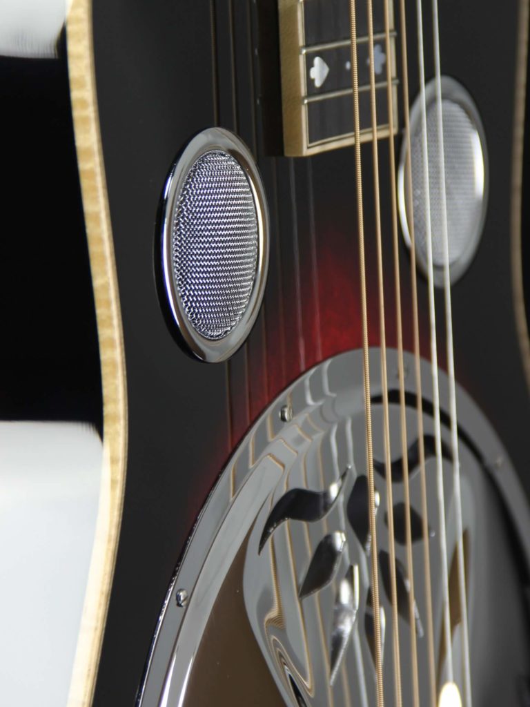 Beard MA-6 resonator guitar close up on soundholes, Scarlet sunburst
