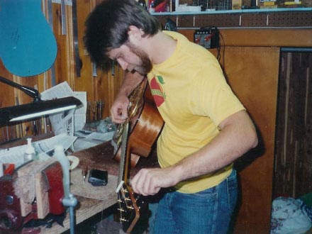 Paul Beard working on guitar