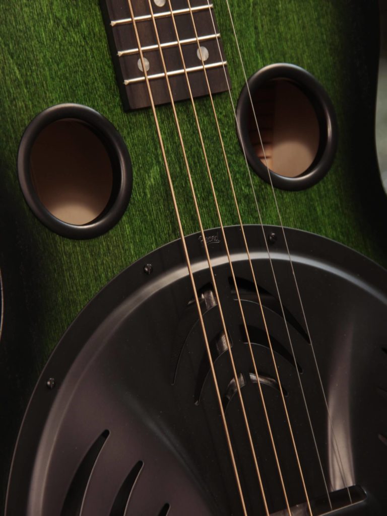 Radio Standard-R resonator guitar close up on coverplate, Emerald green