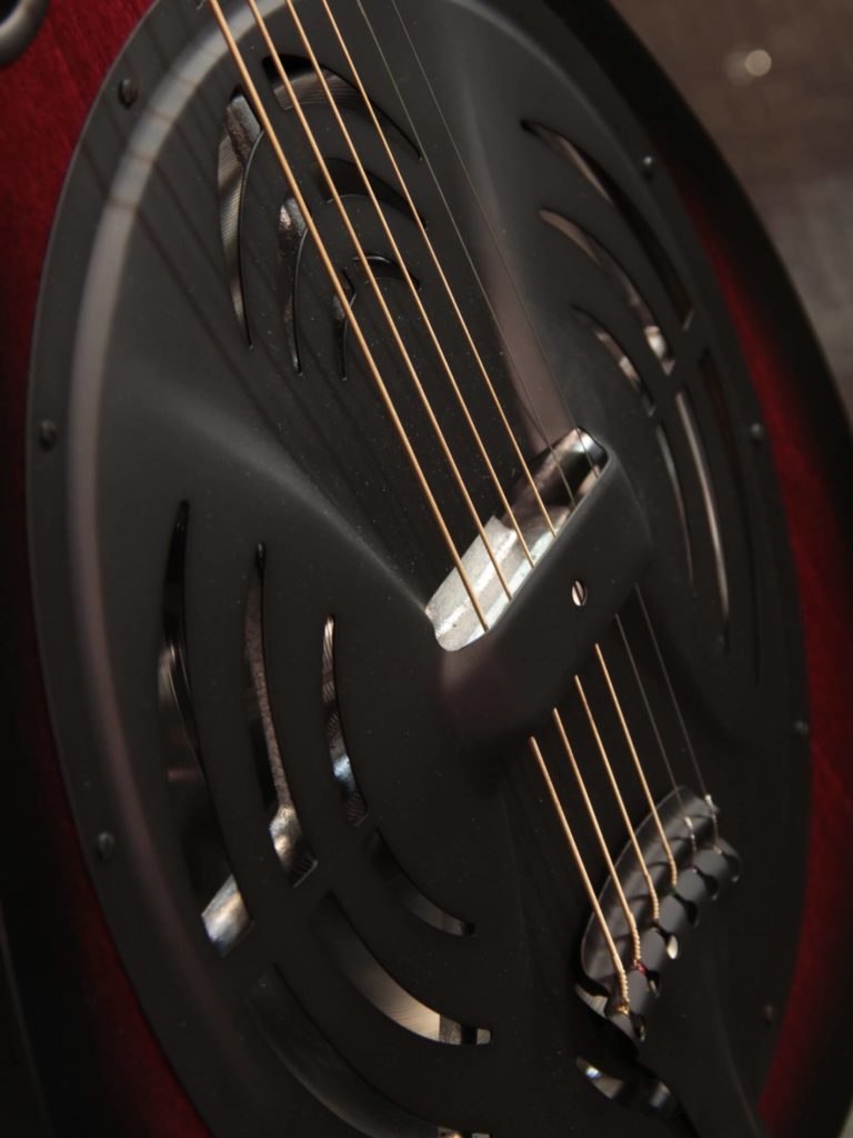 Radio Standard-R resonator guitar close up on coverplate, Scarlet sunburst