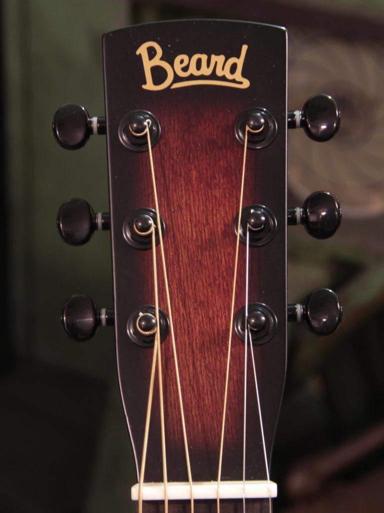 Radio Standard-R resonator guitar close up on peghead, Tobacco sunburst