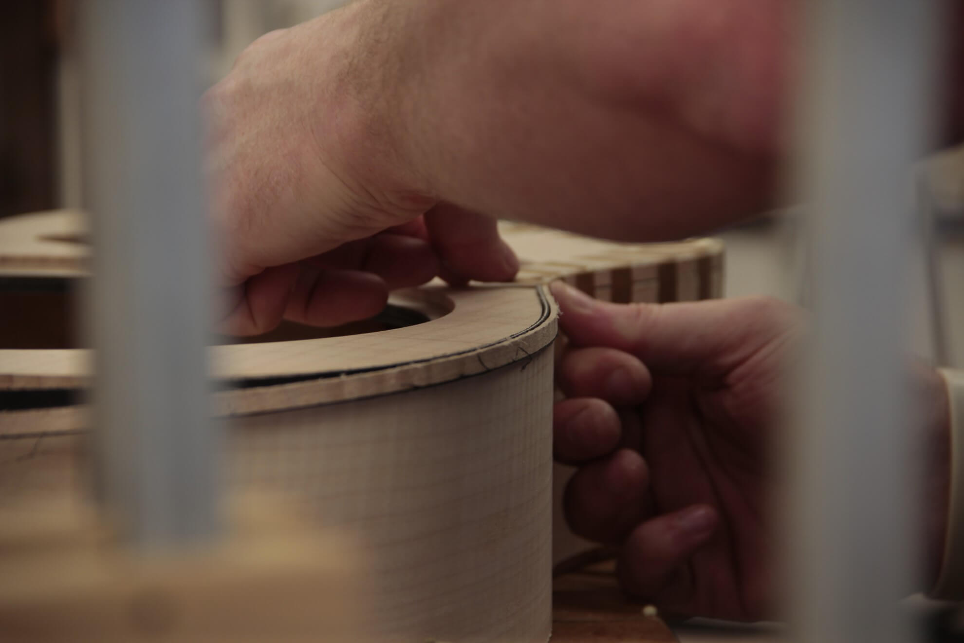 Person gluing on binding