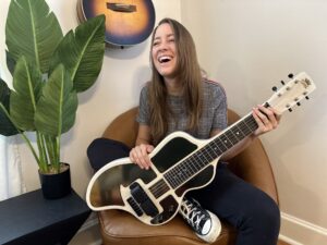 Meghan Lovell from Larkin Poe with her Electro-Liege lapsteel